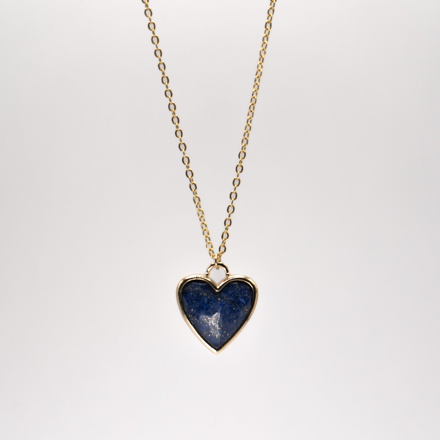 Lula sea Jewellery New Zealand Lapis heart pendant necklace, made from 18k gold and natural facet cut gem stone, vermeil, pictured hanging 